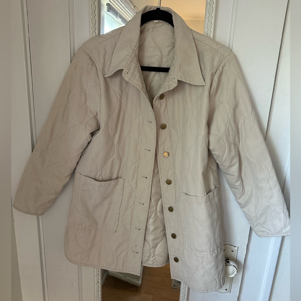 Quilted jacket with brass detail buttons